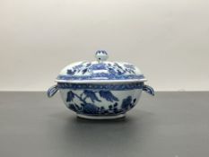 A Chinese export ware porcelain blue and white twin-handled tureen with chrysanthemums and foliate