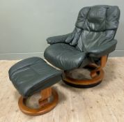 A mid-century Norwegian reclining armchair by Ekornes, padded back, seat and arms upholstered in
