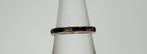 A white metal blue and clear stone eternity style ring O 1.7g
