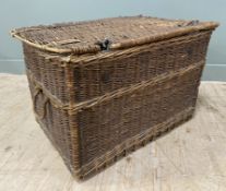 An early 20th century wicker hamper: H. 55cm L. 80cm D. 53cm