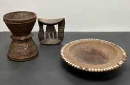 An Indian inticately hand-carved wooden measurement vessel (h. 20.5cm), together with an African
