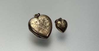A 9ct gold engraved heart-shaped charm: l. x1cm 0.49g and a yellow metal engraved heart-shaped