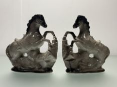A pair of Mid-Century Roaring Horse figures, in a grey and black mottled glaze. (h-22.5cm) (2)