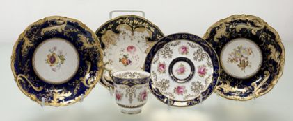 A Cauldon Porcelain pink rose with gilt decoration on blue enamelling teacup (h-6cm) and saucer (w-