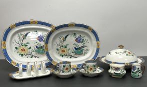 A blue and white chinoiserie Staffordshire and Soane & Smith part service decorated with peackocks