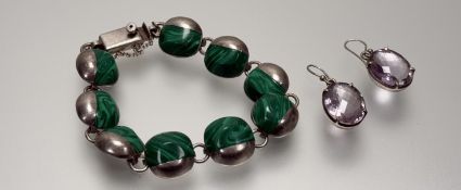 A pair of white metal oval set faceted amethyst earrings: l. x 1.4cm and a silver malachite set