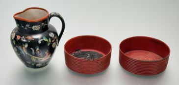 A pair of red laqured raised ribbed paper mache coasters (a/f) (h-5cm) together with a late 19thc