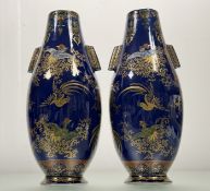 A pair of Chinese Cobalt Blue highlighted with gilt Chinoiserie Pheasant pattern vases, with moulded