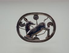 A Georg Jensen Danish sterling silver Arno Malinowski (1899-1976) kneeling fawn brooch stamped verso