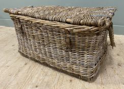 An early 20th century wicker hamper: H. 45cm L. 90cm D. 70cm