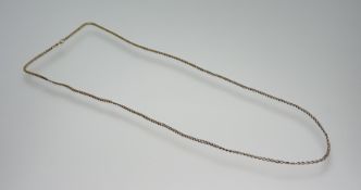 A 9ct gold kerb link chain necklace with ring fastening: l. x 31cm 7.04g