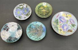 A collection of Chelsea Pottery comprising a footed dish with white foliate decoration on a blue