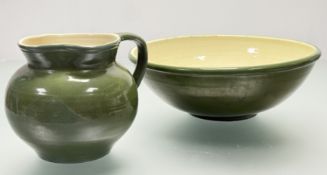 A C.H Brannam Barum N.Devon green glazed squat jug (h-20cm) and a large green glazed fruit bowl (w-