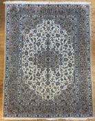 A finely knotted modern Persian Kashan carpet, central panel with medallion surrounded by all-over