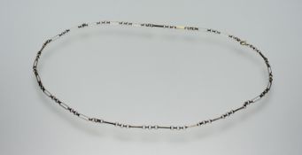 A 9ct gold belcher and oval lozenge link chain necklace with ring fastening: l. x 27cm 6.39g