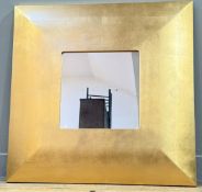 A gold-painted square framed mirror with glass panel to centre. (70cmx70cm)