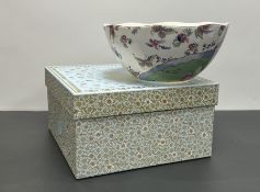A Wedgwood footed bowl with shaped top, decorated in the 'Butterfly Bloom' pattern with gilt