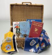 A wicker hamper containing Ski Memorablia comprising, two Glencoe Ski Club First Lady 1965 miniature