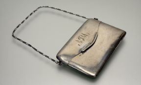 An Edwardian Birmingham silver dance card case with silver chain link strap and original watered