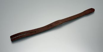 A vintage John J Dick of Lochgelly Fife tawse: l. x 57cm