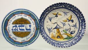 A Ceramic Sevilla Dutch Style hand-painted charger depicting birds and house (w-31cm) together