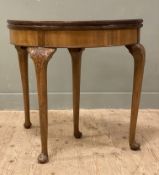 A 1930s George II-style burr walnut card table, with semi-circular cross-banded top opening to