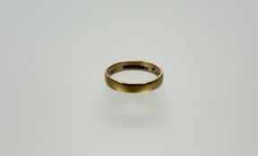An 18ct gold wedding band M /N 2.68g