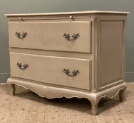 A modern French Provencial-style chest of drawers, serpentine front over slide, fitted two long