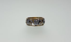 A 9ct gold Cavill troop of elephant ring milligrain set with diamond points M/N 4.55g