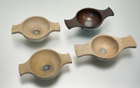 A set of four treen Army Ski Association quaiches with inset silver engraved panels dated 1967, 1968