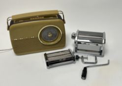 A Bush vintage two-tone brown plastic cased radio with swing handle (untested), together with a
