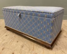 An Edwardian oak-framed Ottoman, blue geometric upholstery with pineapple motifs, lifting to