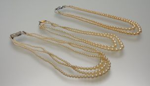 A vintage Ciro paste pearl two-strand graduated necklace with Ciro 9ct gold clasp fastening with