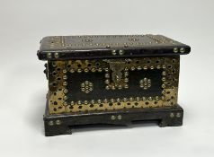 A small Zanzibar style table top chest, solid construction with decorative geometric brass stud work