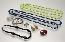 A collection of jewellery to include an Edwardian paste set oval buckle: h. x 5cm l. x 6.5cm, a