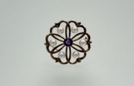 An Edwardian style 9ct gold amethyst set brooch within a surround of six cultured seed pearls: d.