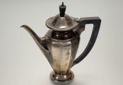 A Edward VII Birmingham silver coffee pot of tapered octagonal baluster form on circualr stepped
