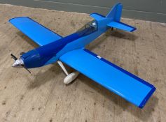 A modern R.C. model aeroplane, with four stroke engine powering twin bladed Master Airscrew