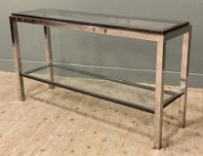 A contemporary glass-topped console table, rectangular plate set within brass top, raised on steel