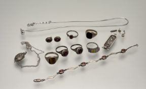 A collection of silver and white metal jewellery to include a silver onyx signet ring U, a silver