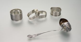 A pair of Birmingham silver octagonal engine turned napkin rings engraved B 1 and B 2: l. x 4.5cm