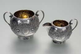 A Victorain Hamilton & Inches Edinburgh silver two piece morning tea set comprising a two handled