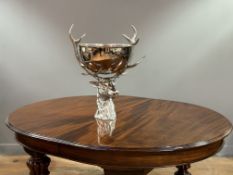 An impressive cast white metal table centrepiece in the form of a stag's head, with champagne bowl