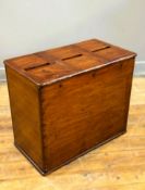A 19thc stained pine country house three-section mailbox with lift-up lockable compartments and
