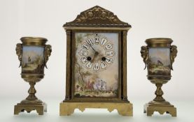 A Gilt Metal and Porcelain Mounted Striking Mantel Clock Garniture, circa 1880, the architectural
