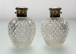 A pair of large George V silver-mounted cut-glass scent bottles, Lee & Wigfull, Sheffield 1915,