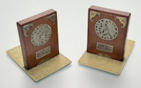 A pair of Chinese jadeite and brass-mounted hardwood bookends, early 20th century, each wooden block