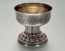 William Hutton & Sons Ltd. London, an Edwardian silver gilt Communion or wafer cup in the Medieval