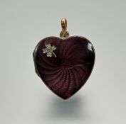 A French gold overlay white heart locket with plum guilloche radiating enamel front inset with a