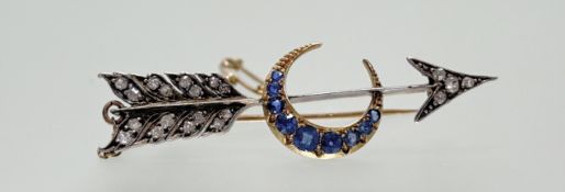 A Victorian diamond and sapphire arrow brooch, late 19th century, the arrow head and flight set with